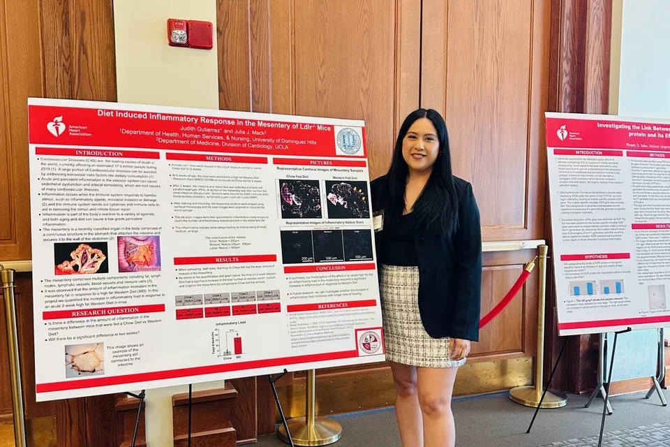 Judy presents her research poster at the HSI Scholar Symposium