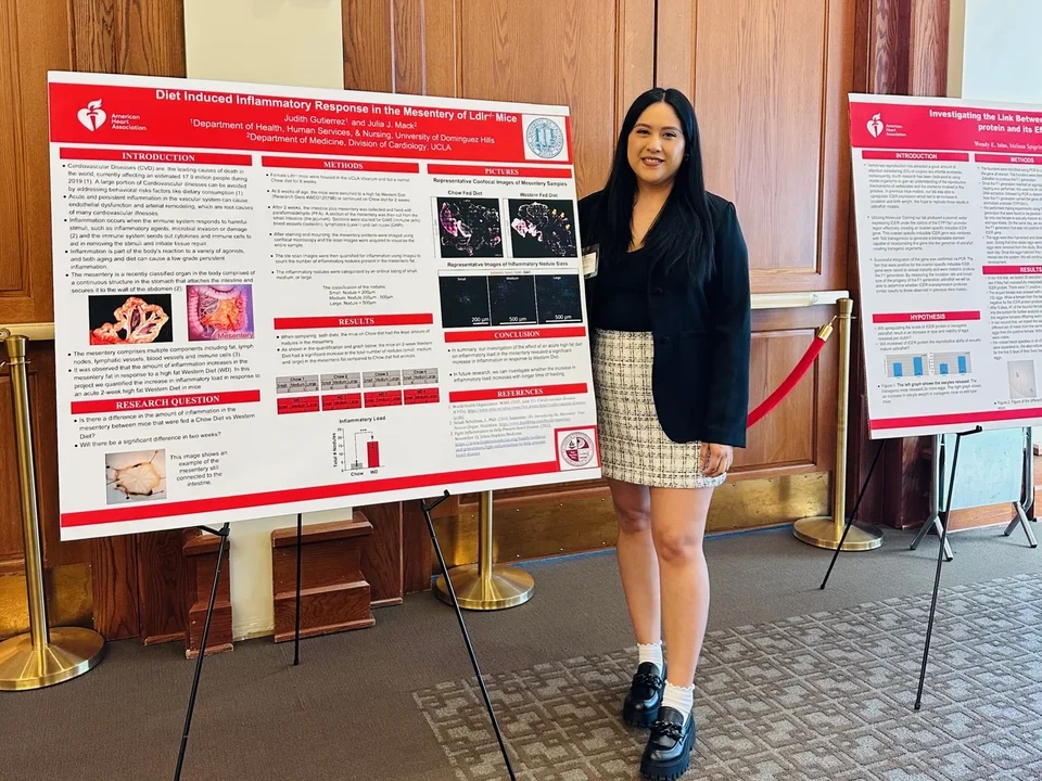 Judy presents her research poster at the HSI Scholar Symposium